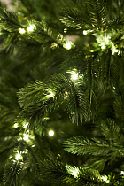 Ель с лампочками литая Таежная